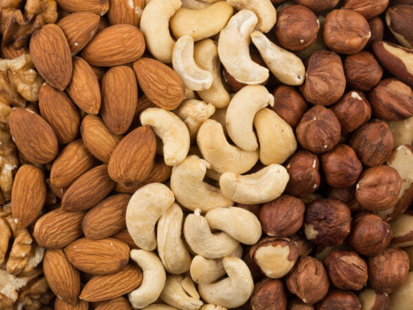 mixe of various nuts background above closeup